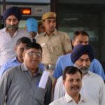 Malvinder Singh and his brother Shivinder Singh inside a court premise in New Delhi.