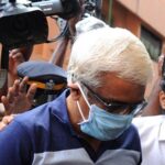 M Sivasankar enters the ED office in Kochi after being taken into custody by the central agency.