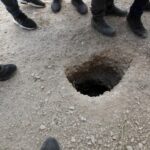 The tunnel emerged in a rural strip of land near the prison's walls