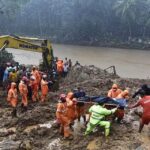 A body being recovered from the debris of the Kokkayar landslide at nearby Makochi in Idukki.