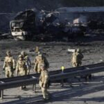 Russian troops press on Kyiv; Ukraine president to fight on