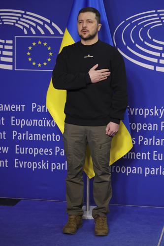 Ukraine's President Volodymyr Zelenskyy poses for a picture before an EU summit at the European Parliament in Brussels, Belgium, Thursday, Feb. 9, 2023.