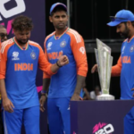 India's captain Rohit Sharma and teammates Suryakumar Yadav, Kuldeep Yadav and Mohd Siraj stand next to the winners' trophy after winning against South Africa in the ICC Men's T20 World Cup final cricket match at Kensington Oval in Bridgetown, Barbados, Saturday.