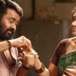 Mohanlal in a still from the film Thudarum, celebrating its box office success.