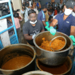Health officials inspecting sealed canteen near Kadavanthra in Kochi after discovery of stale chicken stored in unhygienic conditions.